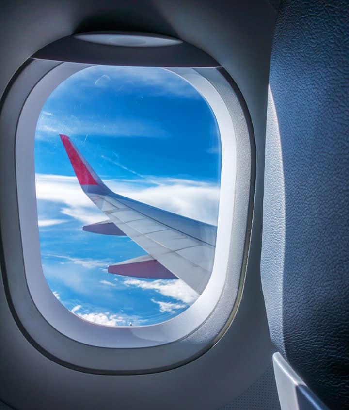 Airplane window view-pane