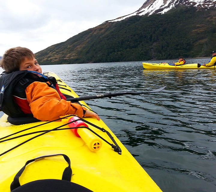 Patagonia Family Kayaking in Fjord of Last Hope