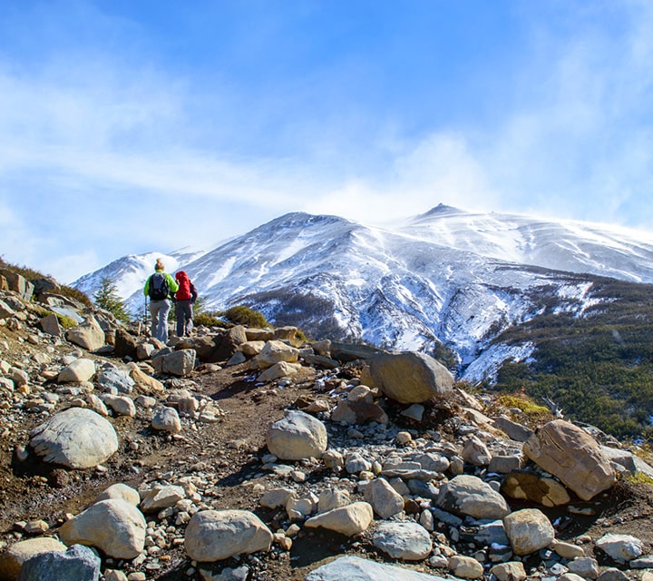Hikers enjoying the mountaintop views in Patagonia