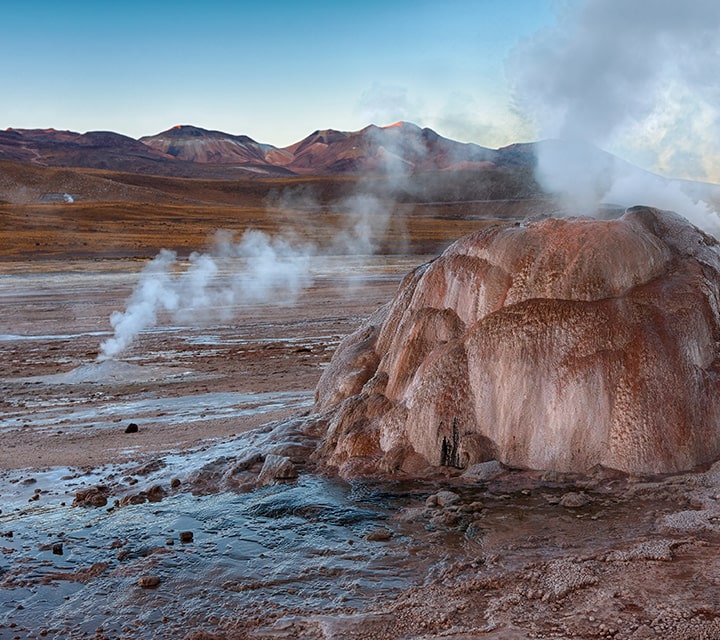 Geysers del Tatio (Tatio Geysers) hissing steam in the Atacama Desert