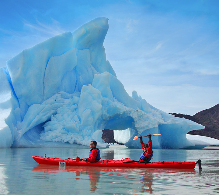 Kayaking by glaciers in Patagonia