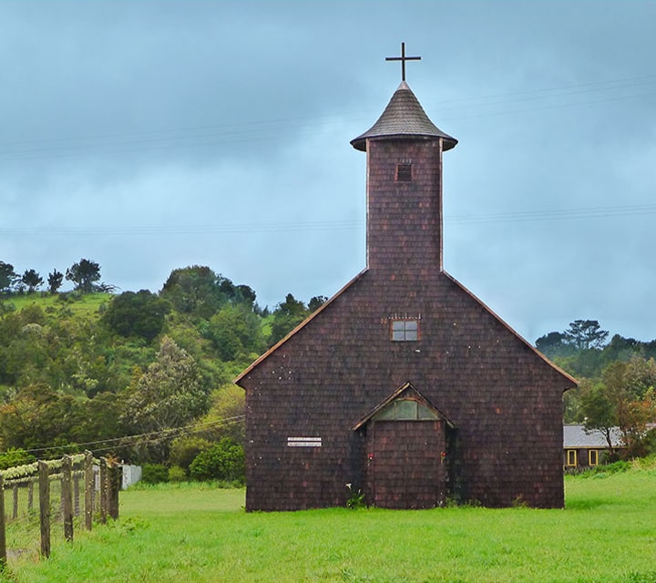 Chiloé Churches, significant architectural structures protected by the 1996 World Monuments Watch yield tourism, traditions and culture
