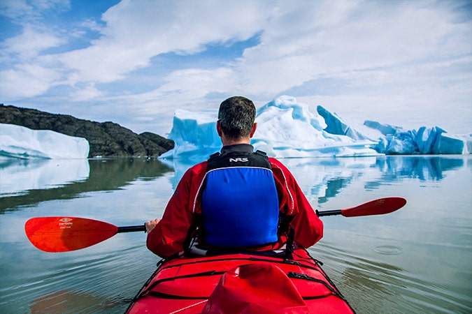A man glacier kayaking in Patagonia
